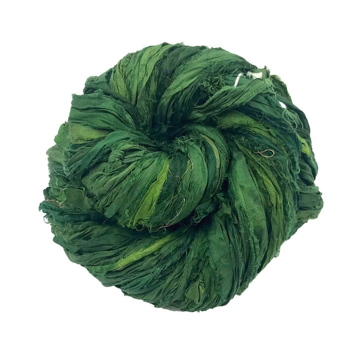 Tightly-knit twisted bundle of green fabric strips.
