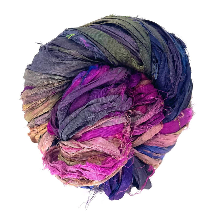 A used multi-color sari silk Yarn rolled.