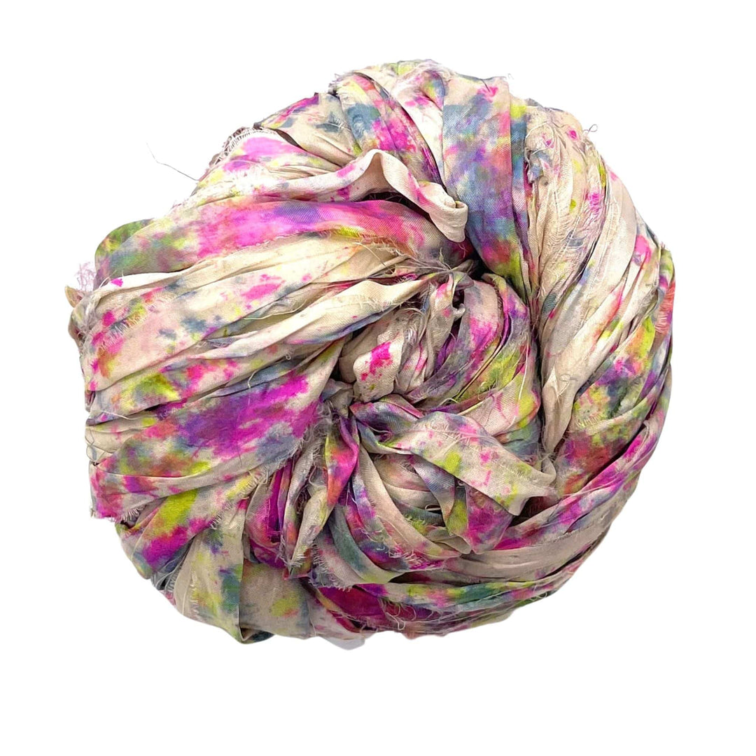A used multi-color sari silk Yarn rolled.